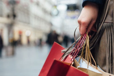 Lady carrying bags